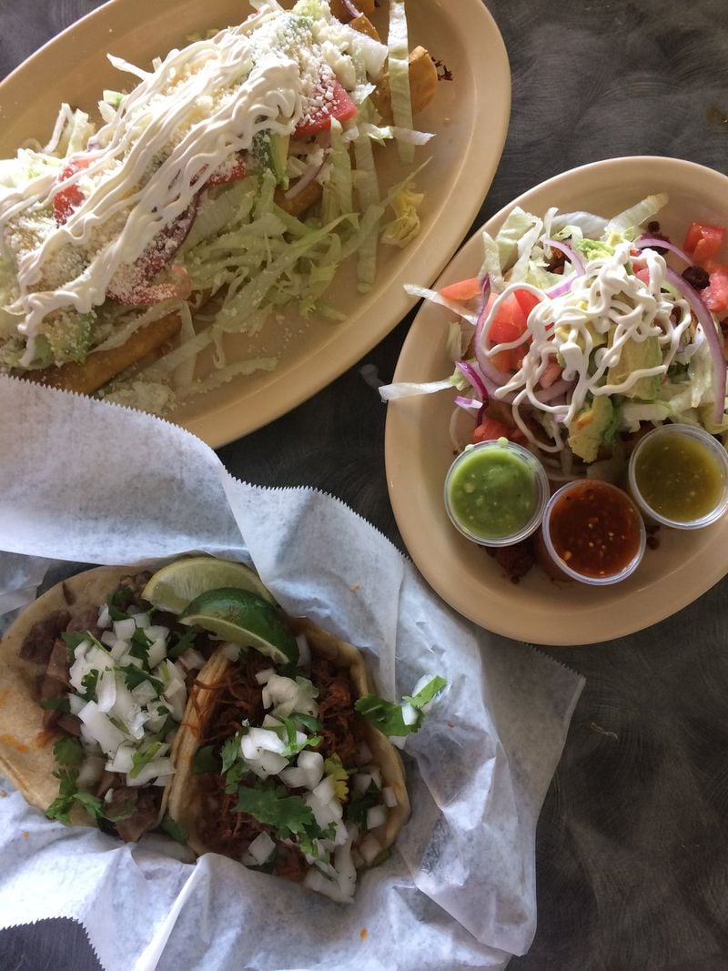 Tacos La Villa in Smyrna serves many classics of the Mexican repertoire, including foot-long flautas stuffed with your meat of choice and showered with toppings (upper left); sopes (right) and tacos such as this lengua and borrego, or lamb barbacoa (bottom left). CONTRIBUTED BY WENDELL BROCK