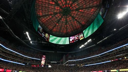 Fans hold up their cellphones during a MLS playoff game between Atlanta United and Columbus Crew at Mercedes-Benz Stadium, Thursday, Oct. 26, 2017, in Atlanta.  Columbus defeated Atlanta 1-0. BRANDEN CAMP/SPECIAL