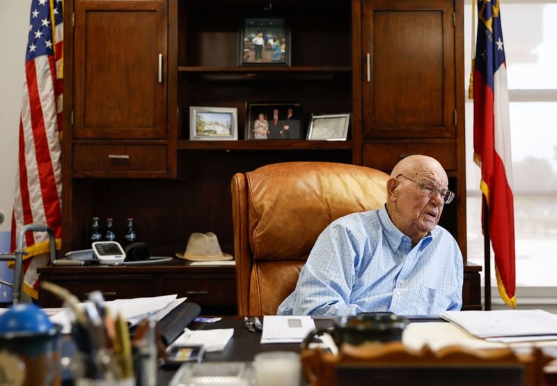 Talton, shown in his office, served 13 straight terms as the Houston County sheriff after he was first elected in 1972. Staff photo by Natrice Miller/ AJC