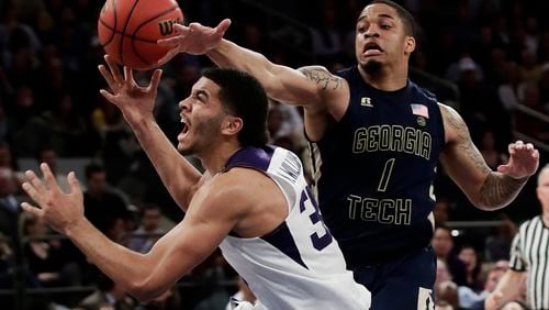 TCU’s Kenrich Williams (34) loses control of the ball as he drives to the basket past Georgia Tech’s Tadric Jackson (1) during the first half of an NCAA college basketball game in the final of the NIT Thursday, March 30, 2017, in New York. (AP Photo/Frank Franklin II)