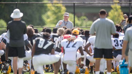 Kennesaw State coach Brian Bohannon speaks with his team. (Photo courtesy of KSU Sports Information)