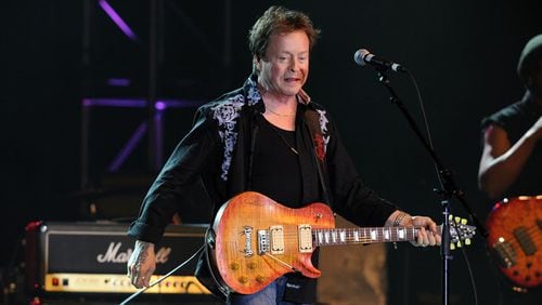 Rick Derringer, performing in 2012, was detained at Hartsfield-Jackson International Airport on Monday. (Credit: Jeff Daly/Invision/AP)