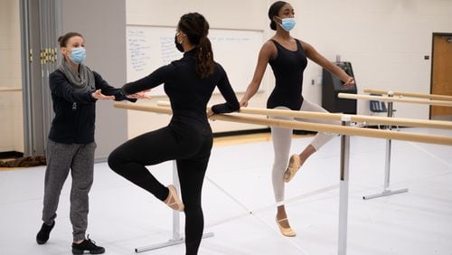 211208-Lawrenceville-Autumn Eckman works with a student in ballet class at the new Gwinnett School of the Arts in Lawrenceville on Wednesday, Dec. 8, 2021. Ben Gray for the Atlanta Journal-Constitution