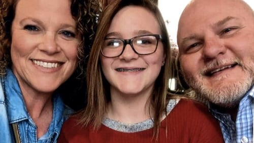 Carroll County Sheriff's Deputy Jody Smith, right, died from COVID-19 complications Sept. 3. His widow, Cheryl Smith, believes he contracted the disease in the Carroll County Jail. They are pictured with their daughter, Bella, who enjoyed playing softball with her father.