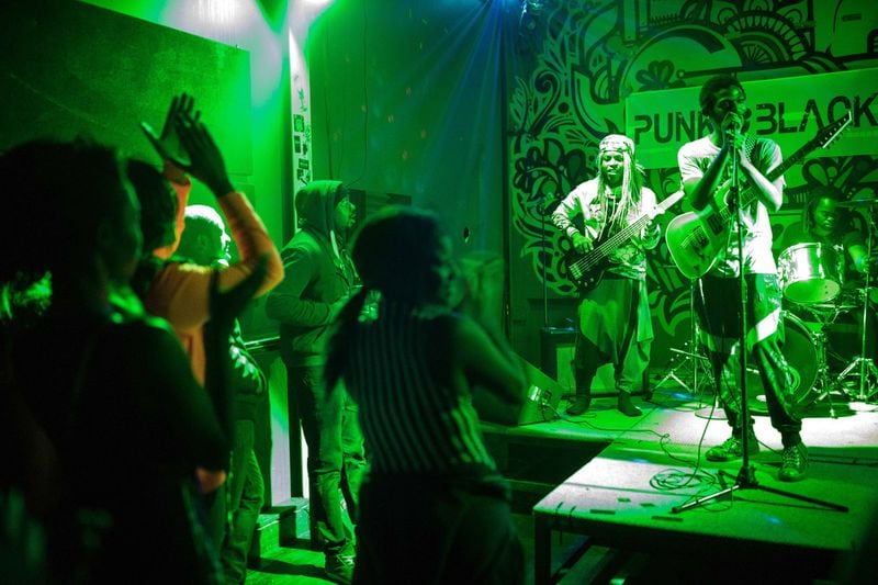 Fans watch punk rock band KillerKroc perform during a Punk Black event at Union EAV, an event that hosts minority-led punk rock bands, on Dec. 14, 2017. BRANDEN CAMP / SPECIAL