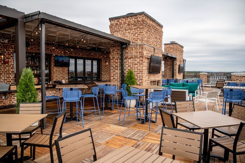 UP on the Roof's patio offers 360-degree rooftop views, ranging from nearby Town Green and City Hall, to Kennesaw Mountain in the distance. (Mia Yakel for The Atlanta Journal-Constitution)