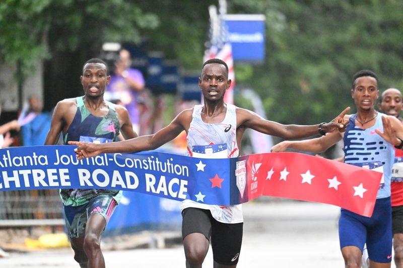 Charles Langat wins the 54th running of the Atlanta Journal-Constitution Peachtree Road Race in Atlanta on Tuesday, July 4, 2023.   (Hyosub Shin / Hyosub.Shin@ajc.com)