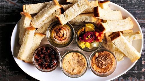 Empire State South's pimento cheese is served with the In Jar appetizer, featuring boiled peanut hummus, pickled vegetables and other snacks.