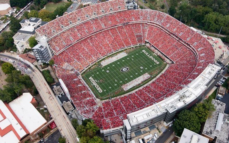 With a seating capacity of 92,746, Sanford Stadium in Athens is the largest football stadium in Georgia.