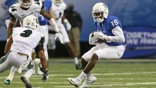 Georgia State Panthers wide receiver Robert Davis (19) makes a move on Charlotte 49ers defensive back Branden Dozier (3) after a reception in the second quarter of their game at the Georgia Dome, September 4, 2015, in Atlanta. PHOTO / JASON GETZ