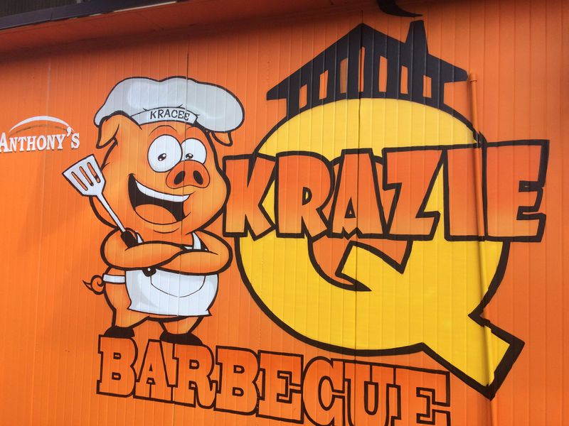 Visitors to Krazie Barbecue in Scottdale are greeted by whimsical outdoor signage. CONTRIBUTED BY WENDELL BROCK