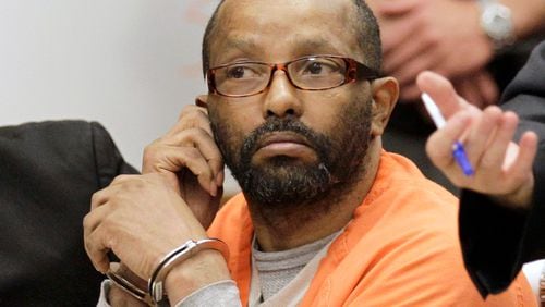 In this May 2011 photo, Anthony Sowell appears in court in Cleveland. Sowell, an Ohio man sentenced to death for killing 11 women and hiding their remains in and around his home, has died in prison. The state Corrections Department says the 61-year-old convicted serial killer was receiving end-of-life care at Franklin Medical Center for a terminal illness when he died Monday. (AP Photo/Amy Sancetta, File)