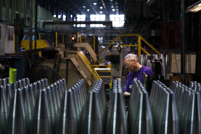 FILE -A steel worker manufactures 155 mm M795 artillery projectiles at the Scranton Army Ammunition Plant in Scranton, Pa., Thursday, April 13, 2023. The Pentagon could get weapons moving to Ukraine within days if Congress passes a long-delayed aid bill. That's because it has a network of storage sites in the U.S. and Europe that already hold the ammunition and air defense components that Kyiv desperately needs. Moving fast is critical, CIA Director Bill Burns said Thursday, April 18, 2024. (AP Photo/Matt Rourke, File)