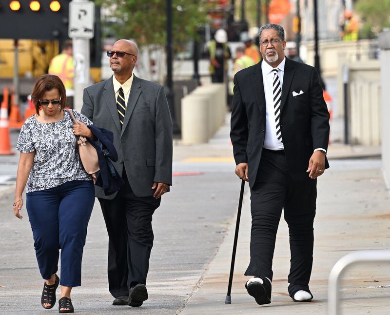 July 13 , 2022 Atlanta - Ex-Stonecrest mayor Jason Lary (right) arrives at the Richard B. Russell Federal Building for his sentencing hearing in federal fraud case related to misusing city’s COVID relief funds on Wednesday, July 13, 2022. (Hyosub Shin / Hyosub.Shin@ajc.com)