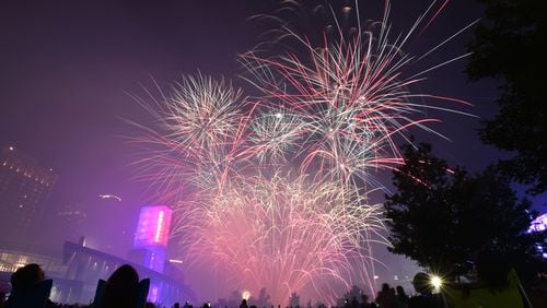 July 4, 2017 Atlanta - The finale fireworks spectacular light up over the Downtown skyline during Centennial Olympic Park's Fourth of July Celebration on Tuesday, July 4, 2017. Centennial Olympic Parkâs annual Fourth of July Celebration offers free family-oriented entertainment, including live music and the Southeastâs largest fireworks display. Georgia World Congress Center Authority, which owns and operates the 21-acre park, has partnered with Lenox Square to combine both facilitiesâ popular fireworks shows. HYOSUB SHIN / HSHIN@AJC.COM