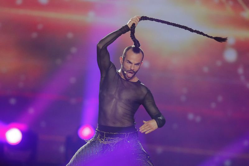 FILE - Slavko Kalezic from Montenegro performs the song "Space" during the first semifinal for the Eurovision Song Contest, in Kiev, Ukraine, May 9, 2017. The 68th Eurovision Song Contest is taking place in May in Malmö, Sweden. It will see acts from 37 countries vie for the continent’s pop crown. Founded in 1956, Eurovision is a feelgood extravaganza that strives to banish international strife and division. It’s known for songs that range from anthemic to extremely silly, often with elaborate costumes and spectacular staging. (AP Photo/Efrem Lukatsky, File)