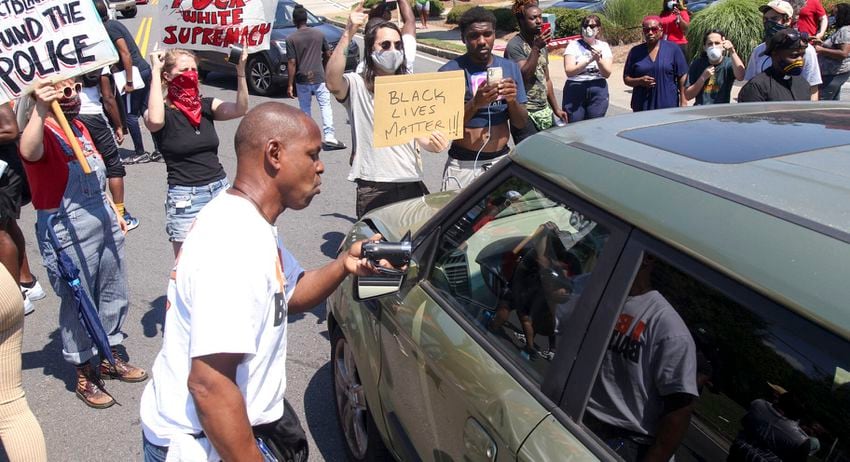 PHOTOS: Protesters hold demonstration in Atlanta over police shooting of Rayshard Brooks