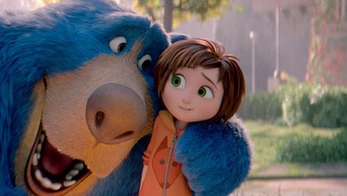Boomer the Bear (voice of Ken Hudson Campbell) and June (Brianna Denski) in a scene from “Wonder Park.” Paramount Animation/Nickelodeon Movies