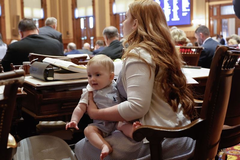 Rep. Lauren Daniel, R-Locust Grove, holds her baby Zane in the House chambers on Sine Die at the Georgia State Capitol on Thursday, March 28, 2024. (Natrice Miller/ Natrice.miller@ajc.com)