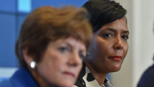 December 1, 2017 Atlanta - Atlanta mayoral candidates Mary Norwood (left) and Keisha Lance Bottoms discuss during an event to discuss on the topic of education at the Gathering Spot in Atlanta on Friday, December 1, 2017. HYOSUB SHIN / HSHIN@AJC.COM