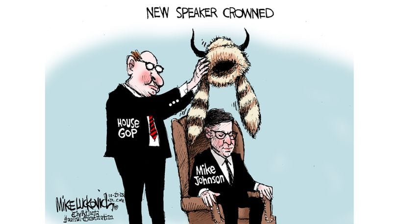 House GOP crowning the new Speaker of the House with the hat of the QAnon Shaman.