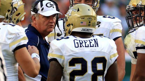 MIAMI GARDENS, FL - OCTOBER 14: Head coach Paul Johnson of the Georgia Tech Yellow Jackets  talks to J.J. Green #28 during a game against the Miami Hurricanes at Sun Life Stadium on October 14, 2017 in Miami Gardens, Florida.  (Photo by Mike Ehrmann/Getty Images)
