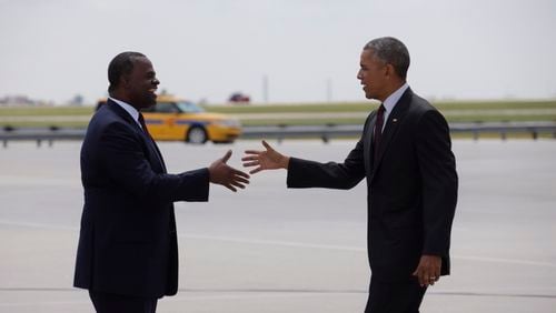 Atlanta Mayor Kasim Reed greets President Barack Obama after Air Force One landed in Atlanta on Aug. 1, 2016. (Bob Andres, bandres@ajc.com)
