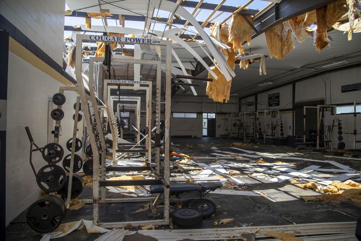 The roof of Newnan High School's weight room also saw damage. (Alyssa Pointer / Alyssa.Pointer@ajc.com)