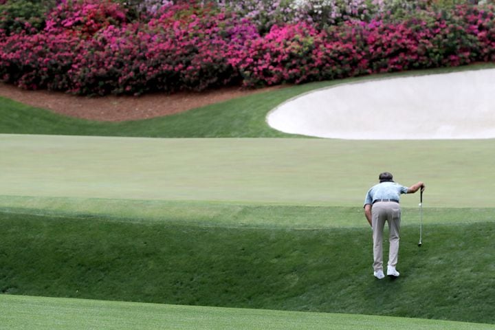 April 8, 2021, Augusta: Bubba Watson prepares to putt on the thirteenth green during the first round of the Masters at Augusta National Golf Club on Thursday, April 8, 2021, in Augusta. Curtis Compton/ccompton@ajc.com