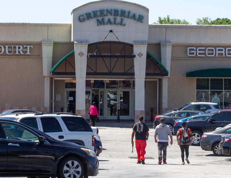 People make their way into the Greenbriar Mall in southwest Atlanta on Friday, May 1, 2020. STEVE SCHAEFER / SPECIAL TO THE AJC
