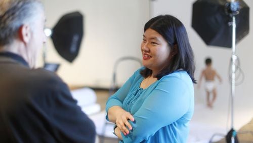 Wendy Hsiao, a PR professional and 2009 UGA graduate, oversees a photo shoot for the National Down Syndrome Congress and Comfees diapers to be used in their 2020 ad campaign. Bob Andres / bandres@ajc.com