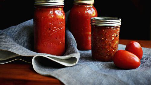 Oven-Roasted Marinara, Charred Tomato and Chile Salsa and Bottled Whole Tomatoes are just some of the ways to "put up" tomatoes in this rush of tomato season. (Juli Leonard/Raleigh News & Observer/TNS)