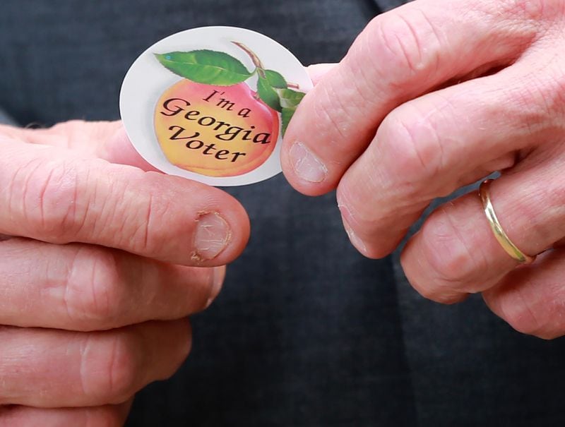  'I'm a Georgia Voter' sticker. Curtis Compton/ccompton@ajc.com