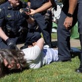 Police arrest Emory University economics professor Caroline Fohlin during a rally in which pro-Palestinian protesters set up an encampment at the Emory Campus in Atlanta on Thursday, April 25, 2024. (Arvin Temkar / AJC)
