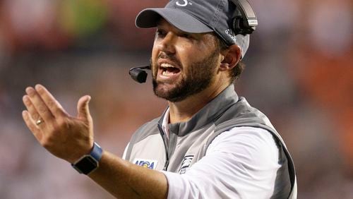 Georgia Southern head coach Tyson Summers calls in defensive players in the first half of an NCAA college football game against Auburn, Saturday, Sept. 2, 2017, in Auburn, Ala. (AP Photo/Brynn Anderson)