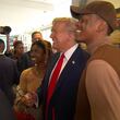 Former President Donald Trump meets customers at a Chick-fil-A while in Atlanta on Wednesday.