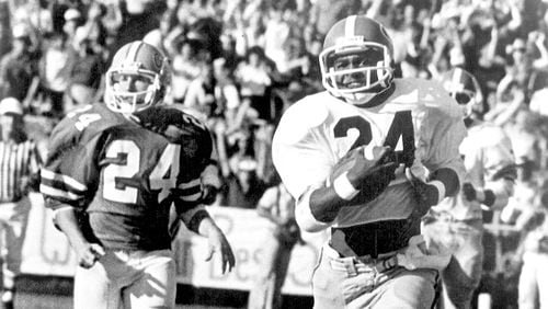 Lindsay Scott races down the sidelines to the game-winning touchdown with 1:04 left to play in Georgia's 26-21 victory over Florida in 1980.