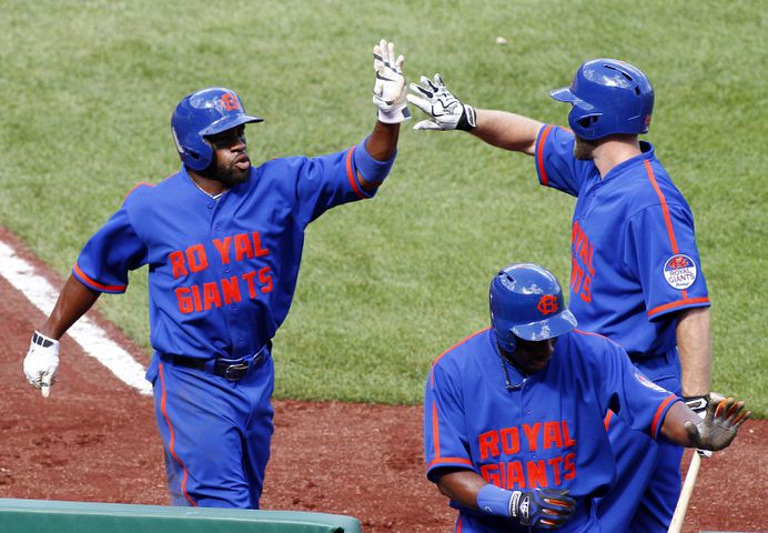 Bright blue and bright orange collide on Mets uniforms