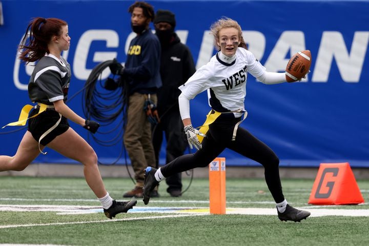 West Forsyth wide receiver Caroline Coggin scores a touchdown against Hillgrove during the first half of the Class 6A-7A Flag Football championship at Center Parc Stadium Monday, December 28, 2020 in Atlanta, Ga.. JASON GETZ FOR THE ATLANTA JOURNAL-CONSTITUTION