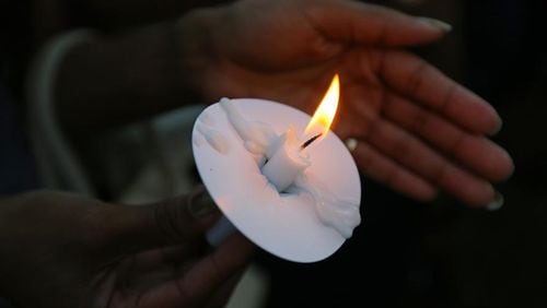 Cobb County will hold its annual candlelight vigil on Nov. 19 for those who wish to remember their loved ones who were victims of homicide. AJC file photo