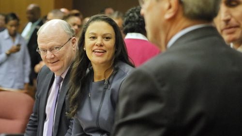 Attorney Charles Huddleston (left) and Meria Carstarphen, superintendent of Atlanta Public Schools, are all smiles after DeKalb Judge Alan Harvey agreed in November to allow Fulton County collect tax money. A number of proposals would change taxing rules for jurisdictions across the county. BOB ANDRES /BANDRES@AJC.COM AJC FILE PHOTO