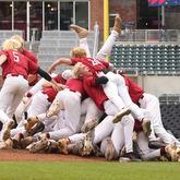 Lowndes players celebrate their 5-2 win against Parkview in game two to win the GHSA baseball 7A state championship at Truist Park, Wednesday, May 17, 2023, in Atlanta. Lowndes won the GHSA baseball 7A state championship series 2-0. (Jason Getz / Jason.Getz@ajc.com)