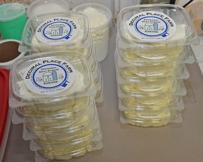 Packages of freshly made artisinal chevre goat cheese from Decimal Place Farm await transport to markets, restaurants and stores. (Chris Hunt for The Atlanta Journal-Constitution)
