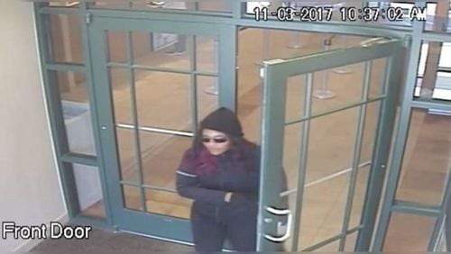 The woman on bank surveillance video is believed to be connected to several metro Atlanta bank robberies, the FBI said Friday.