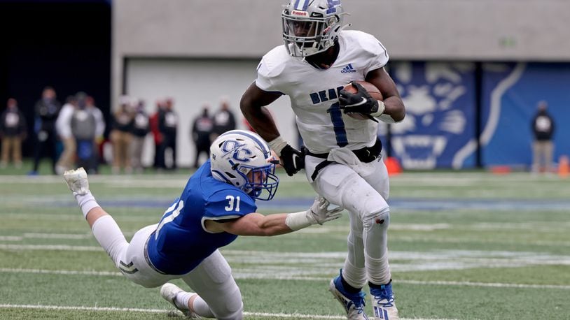 Dec. 30, 2020 - Atlanta, Ga: Pierce County running back DJ Bell (1) scores the game-winning touchdown in overtime to win 13-7 against Oconee County during the Class 3A state high school football final at Center Parc Stadium Wednesday, December 30, 2020 in Atlanta. JASON GETZ FOR THE ATLANTA JOURNAL-CONSTITUTION