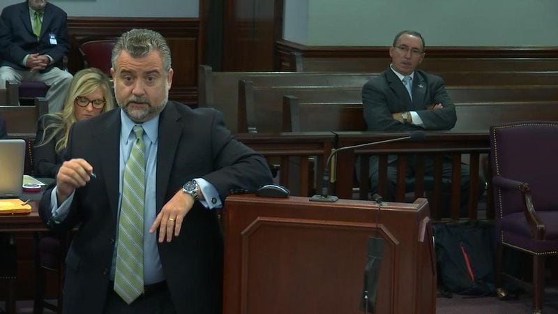 Defense attorney Maddox Kilgore cross examines Cobb County lead detective Phil Stoddard during the murder trial of Justin Ross Harris at the Glynn County Courthouse in Brunswick, Ga., on Wednesday, Oct. 26, 2016. Kilgore opened the morning's questioning by asking Stoddard why he was so suspicious of Harris' wife Leanna. (screen capture via WSB-TV)