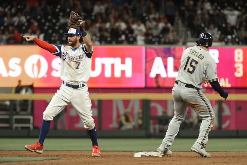 Braves' shortstop Dansby Swanson (7) reacts after tagging out Milwaukee Brewers' left fielder Tyrone Taylor (15) to end the game in the 9th inning at Truist Park on Saturday, May 7, 2022. (Hyosub Shin / Hyosub.Shin@ajc.com)