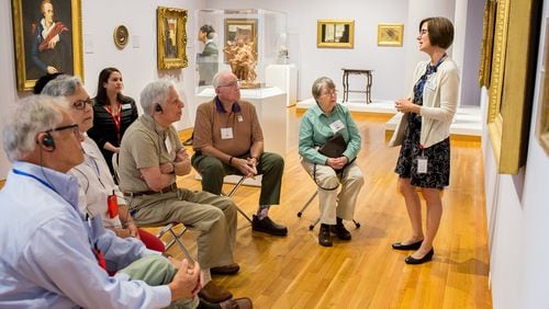 Amanda Williams, an artist and art educator at the High Museum of Art, leads a “Musing Together” art tour designed for groups of visitors in the early stages of Alzheimer’s disease or other dementias, and their care partners.
