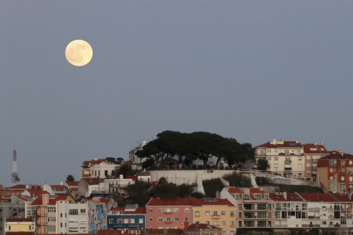 Photos: December full moon, the last of the decade, lights up the night sky