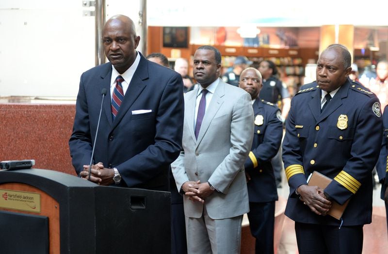 Then-Hartsfield-Jackson International Airport general manager Miguel Southwell, left, gives remarks during a press conference in November 2015 as former Atlanta Mayor Kasim Reed, center, looks on. Documents obtained by The Atlanta Journal-Constitution show Reed reached secret terms with Southwell after he fired the airport boss in 2016. The settlement, which was not revealed in full to City Council or the public, helped end a political crisis after the men accused one another of wrongdoing. KENT D. JOHNSON/KDJOHNSON@AJC.COM